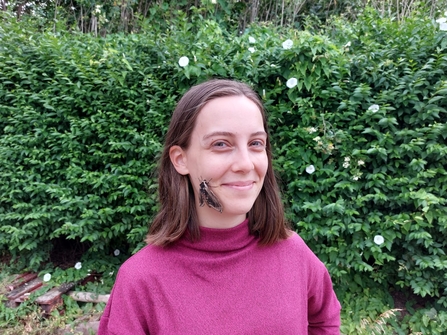 Camille with a hawk-moth on her face!